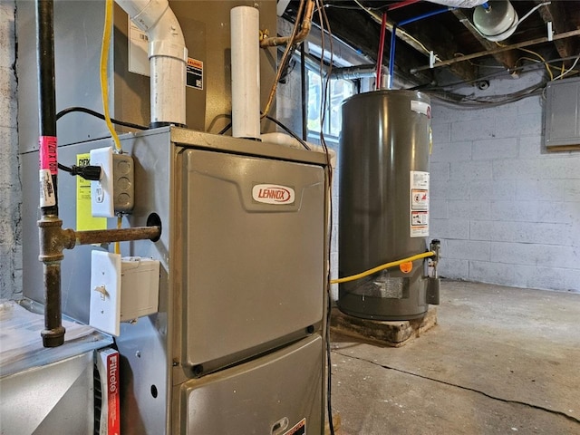 utility room featuring gas water heater