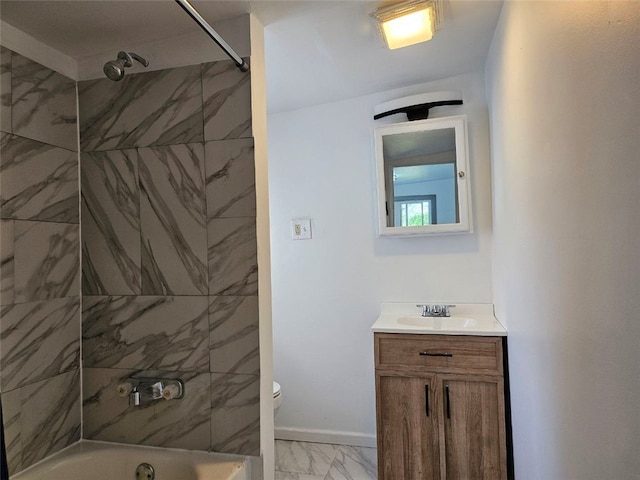 full bathroom with marble look tile flooring, vanity, toilet, washtub / shower combination, and baseboards