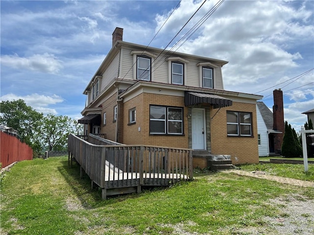 4829 Lougean Ave E, Pittsburgh, PA 15207 - view of front of property featuring a chimney, brick siding, and a wooden deck