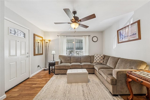 784 Ohio River Blvd, Sewickley, PA 15143 - living room featuring wood finished floors, ceiling fan, plenty of natural light, and baseboards