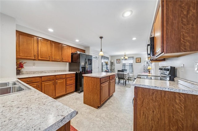 784 Ohio River Blvd, Sewickley, PA 15143 - kitchen with black appliances, a kitchen island, brown cabinets, light countertops, and recessed lighting
