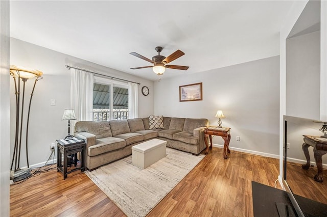 784 Ohio River Blvd, Sewickley, PA 15143 - living area with a ceiling fan, baseboards, and light wood-style floors