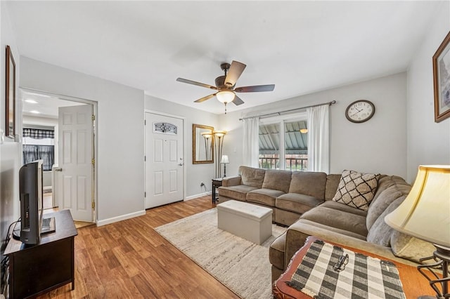 784 Ohio River Blvd, Sewickley, PA 15143 - living area with ceiling fan, wood finished floors, and baseboards