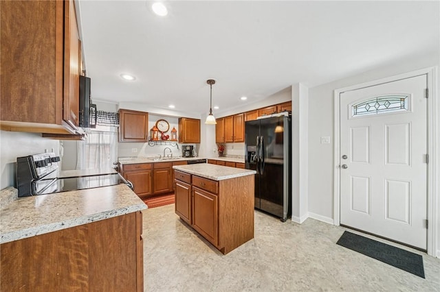 784 Ohio River Blvd, Sewickley, PA 15143 - kitchen with black appliances, brown cabinetry, healthy amount of natural light, and recessed lighting