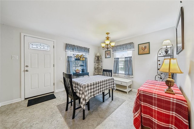 784 Ohio River Blvd, Sewickley, PA 15143 - carpeted dining room with a chandelier and baseboards