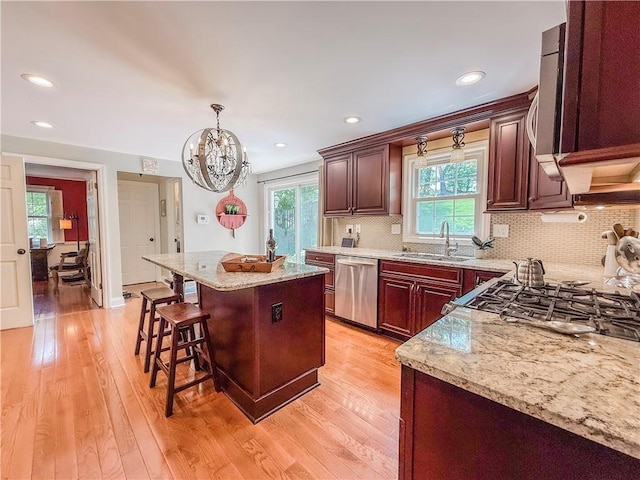2388 Mill Grove Rd, Upper St Clair, PA 15241 - kitchen featuring dishwasher, a sink, light stone counters, healthy amount of natural light, and recessed lighting