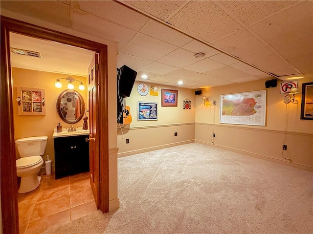 2388 Mill Grove Rd, Upper St Clair, PA 15241 - finished below grade area with light colored carpet, a sink, a paneled ceiling, and recessed lighting