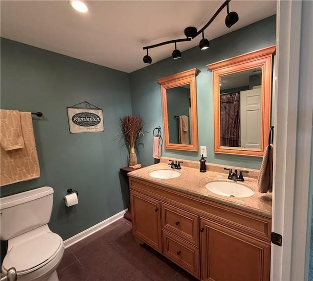2388 Mill Grove Rd, Upper St Clair, PA 15241 - bathroom featuring toilet, tile patterned flooring, double vanity, and baseboards