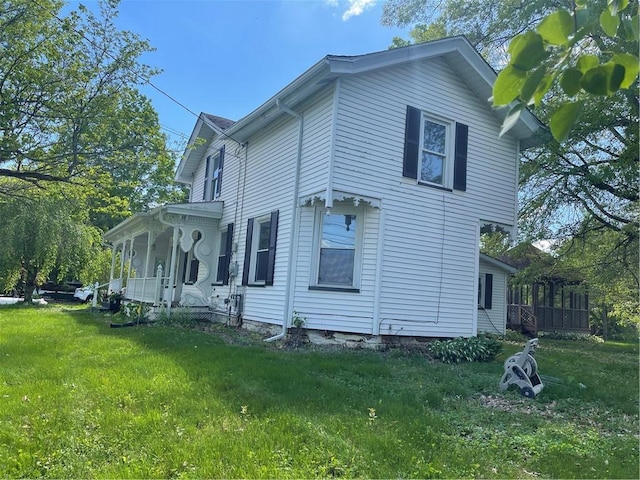 218 S Mercer, Linesville Boro, PA 16424 - view of side of property featuring covered porch and a yard