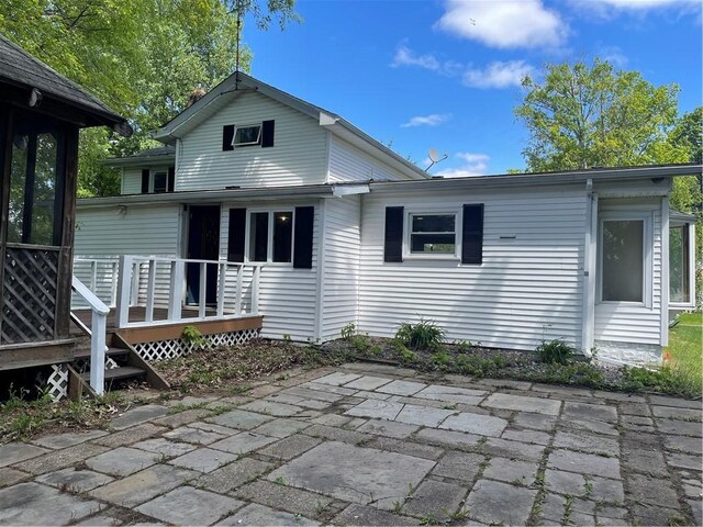 218 S Mercer, Linesville Boro, PA 16424 - rear view of property with a deck and a patio