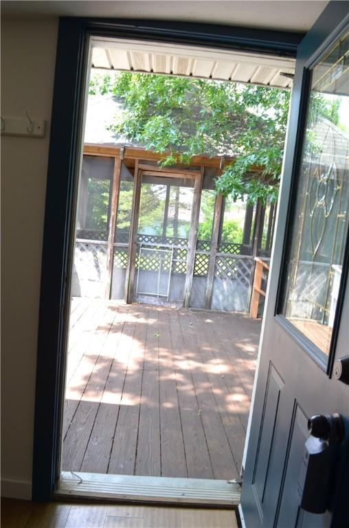 218 S Mercer, Linesville Boro, PA 16424 - doorway featuring hardwood / wood-style flooring and plenty of natural light