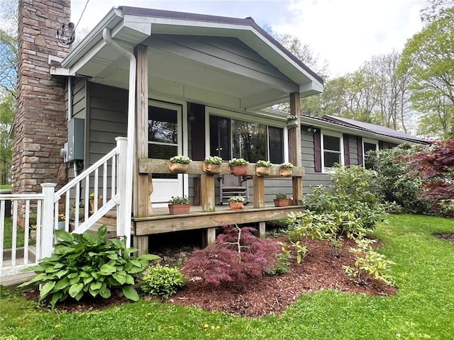 643 Laurel Summit Rd, Jenner Twp, PA 15531 - rear view of house with a chimney