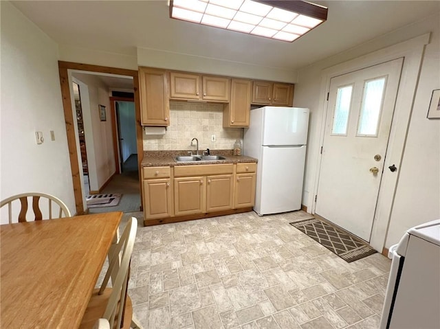 643 Laurel Summit Rd, Jenner Twp, PA 15531 - kitchen with a sink, freestanding refrigerator, range, tasteful backsplash, and stone finish floors