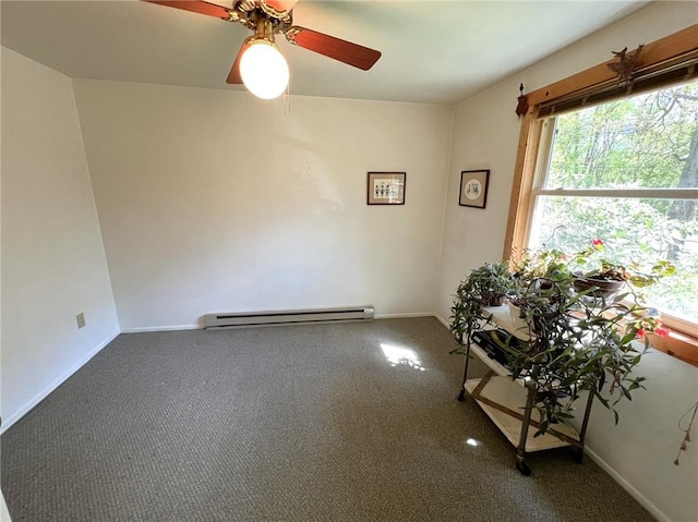 643 Laurel Summit Rd, Jenner Twp, PA 15531 - carpeted spare room featuring a baseboard heating unit, healthy amount of natural light, a ceiling fan, and baseboards
