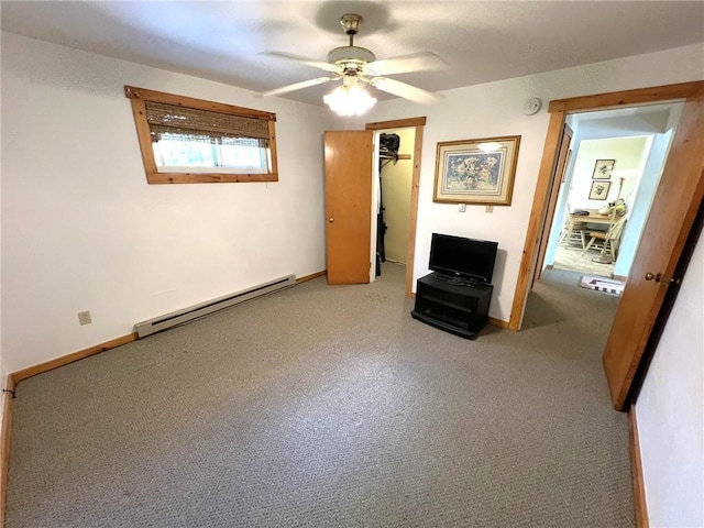 643 Laurel Summit Rd, Jenner Twp, PA 15531 - unfurnished bedroom featuring baseboard heating, carpet floors, a closet, baseboards, and ceiling fan