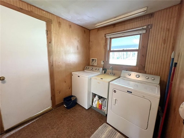 643 Laurel Summit Rd, Jenner Twp, PA 15531 - laundry area featuring washing machine and dryer and wooden walls