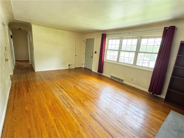 404 Belrose Dr, Rostraver, PA 15012 - unfurnished room featuring wood finished floors and baseboards