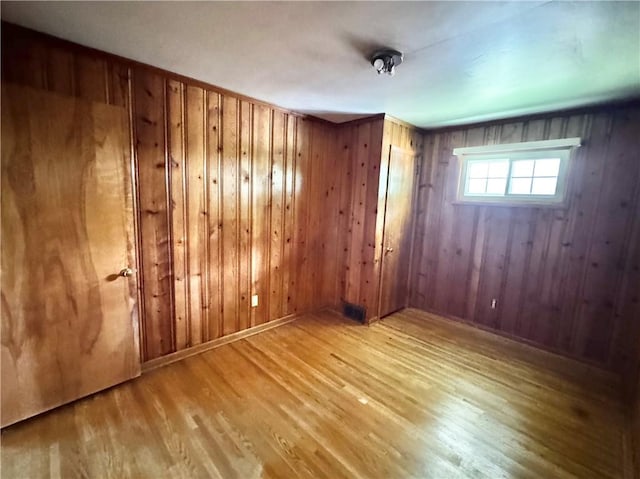 404 Belrose Dr, Rostraver, PA 15012 - unfurnished room with wood finished floors and wood walls