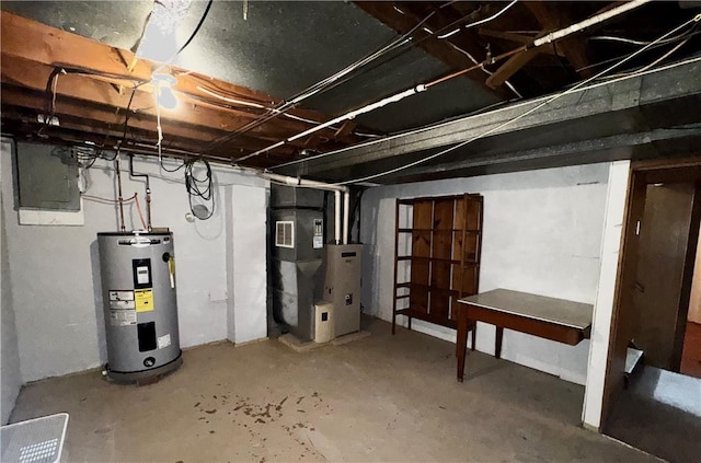 404 Belrose Dr, Rostraver, PA 15012 - unfinished basement featuring electric water heater, heating unit, and electric panel