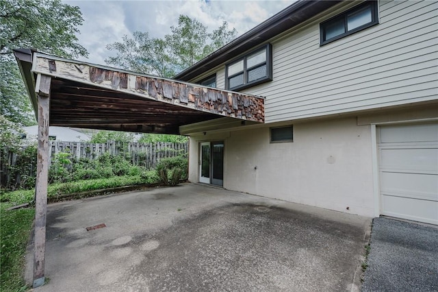 103 Shady Dr, White Twp Ind, PA 15701 - view of parking featuring fence and an attached carport