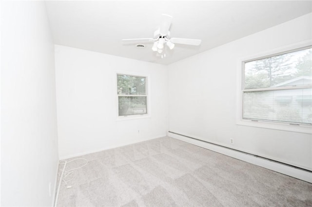 103 Shady Dr, White Twp Ind, PA 15701 - unfurnished room featuring a baseboard heating unit, carpet flooring, and a ceiling fan