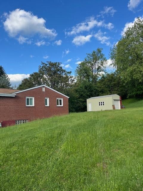 6729 Highland Ave, Union Twp Wsh, PA 15332 - view of yard featuring an outbuilding