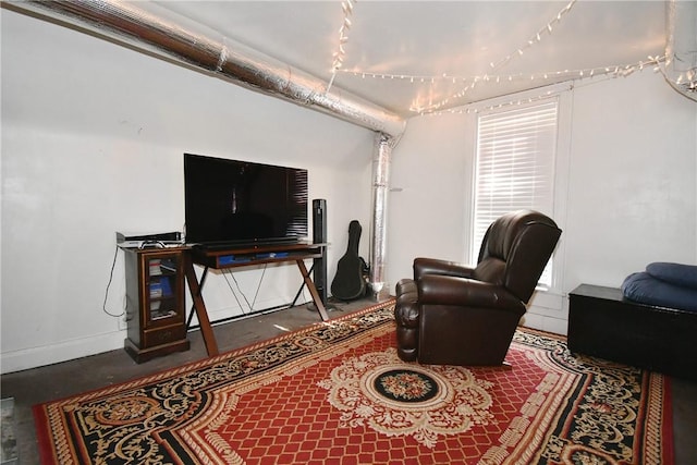 sitting room featuring baseboards