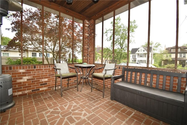 sunroom / solarium with a residential view