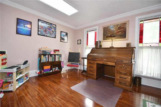 office area with wood finished floors, crown molding, and baseboards