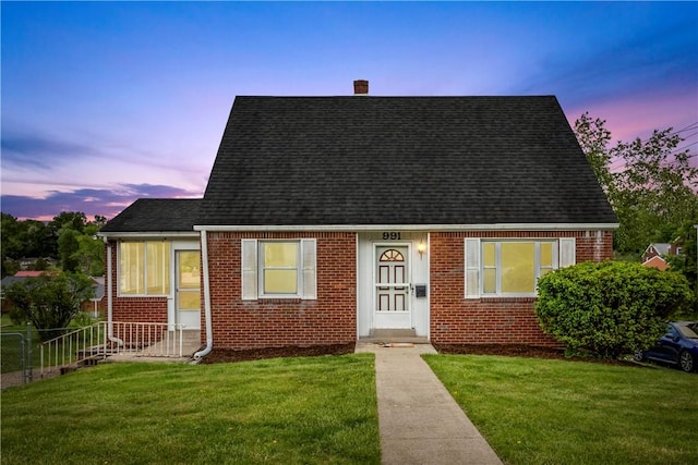 991 Homer Ave, Ross Twp, PA 15237 - view of front of home featuring brick siding, roof with shingles, and a chimney