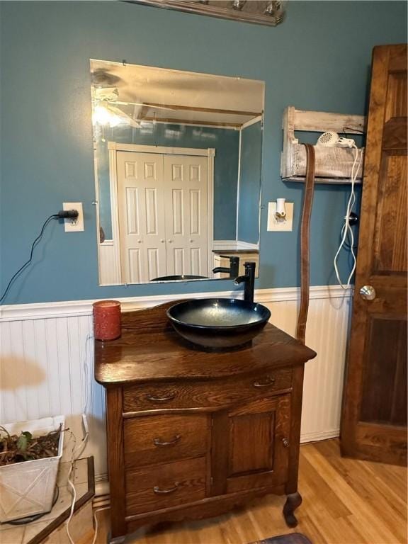 2650 Georgeville Rd, S Mahoning/Plumville, PA 15759 - bathroom with wainscoting, wood finished floors, and vanity