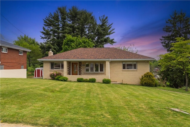 106 High St, Elizabeth Twp/Boro, PA 15037 - view of front of home with a front yard, a chimney, and brick siding
