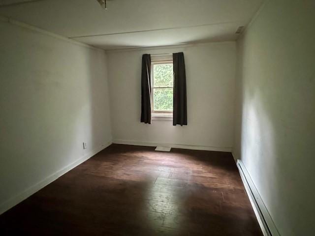 15 Allen Way, White Oak, PA 15131 - unfurnished room featuring wood finished floors, a baseboard radiator, and baseboards