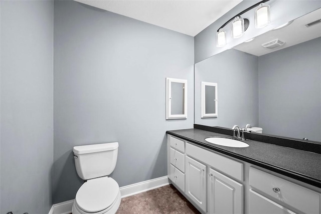 2053 Isleworth, Cranberry Twp, PA 16066 - bathroom featuring toilet, baseboards, and vanity