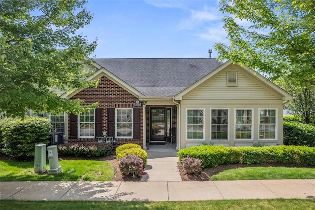 2053 Isleworth, Cranberry Twp, PA 16066 - view of front facade featuring roof with shingles and brick siding