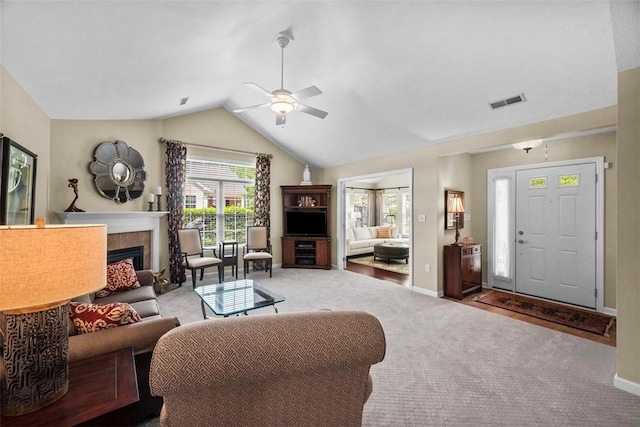2053 Isleworth, Cranberry Twp, PA 16066 - living area with a fireplace, lofted ceiling, carpet, a ceiling fan, and baseboards