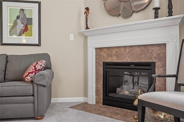 2053 Isleworth, Cranberry Twp, PA 16066 - detailed view of a tile fireplace, baseboards, and carpet flooring
