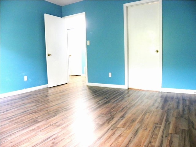 1080 Chatham Park Dr Unit F, Scott Twp Sal, PA 15216 - unfurnished bedroom featuring wood finished floors and baseboards