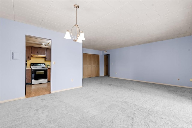611 Calais Dr Unit 4108, Mccandless, PA 15237 - unfurnished living room with light carpet, baseboards, and a chandelier