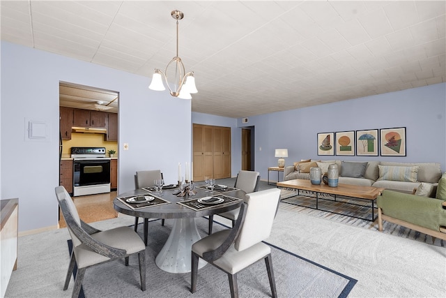 611 Calais Dr Unit 4108, Mccandless, PA 15237 - dining room featuring a chandelier, light colored carpet, and baseboards