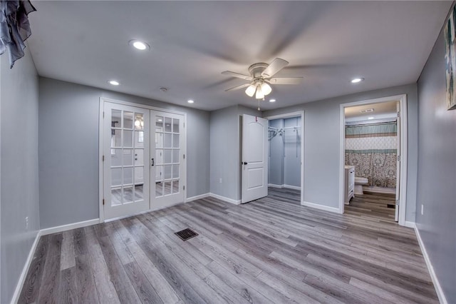 22 Cross Creek Rd, Cross Creek Twp, PA 15312 - unfurnished bedroom with french doors, baseboards, wood finished floors, and recessed lighting