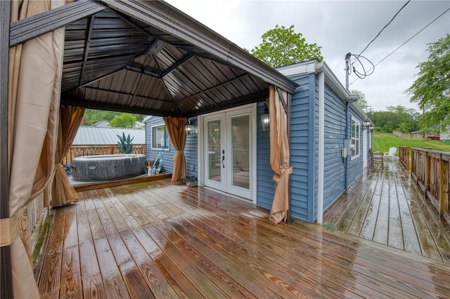 22 Cross Creek Rd, Cross Creek Twp, PA 15312 - wooden deck with french doors, a gazebo, and a hot tub