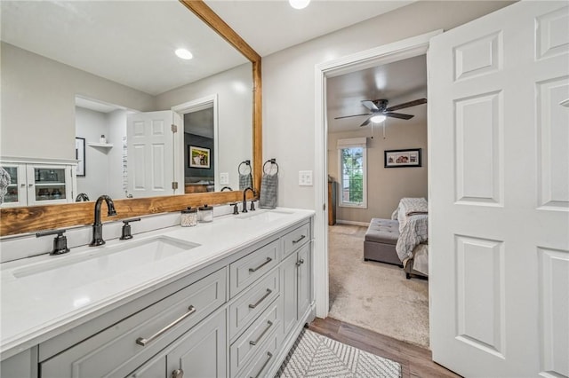 436 Allenberry Dr, Ross Twp, PA 15237 - full bath featuring connected bathroom, double vanity, ceiling fan, recessed lighting, and wood finished floors