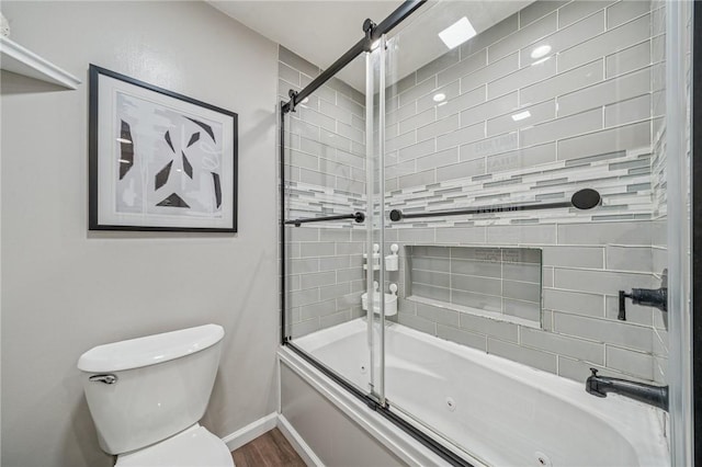 436 Allenberry Dr, Ross Twp, PA 15237 - full bath with a combined bath / shower with jetted tub, baseboards, toilet, and wood finished floors