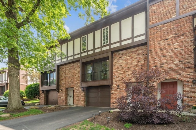 436 Allenberry Dr, Ross Twp, PA 15237 - view of property featuring an attached garage and asphalt driveway