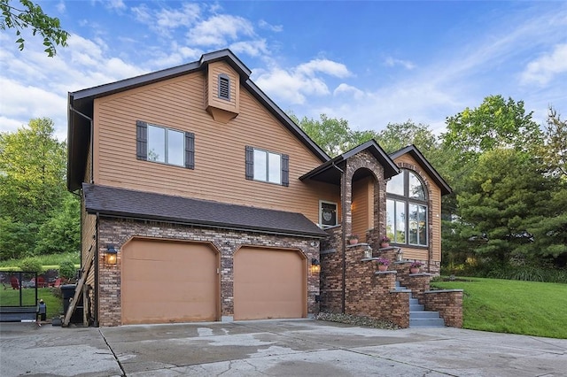 view of front facade with a garage, concrete driveway, a front lawn, and brick siding