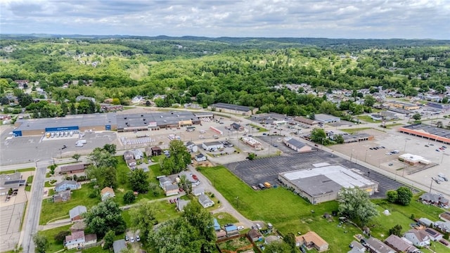 aerial view of property's location with a forest