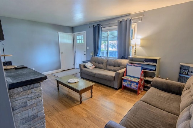 living area featuring light wood-style flooring