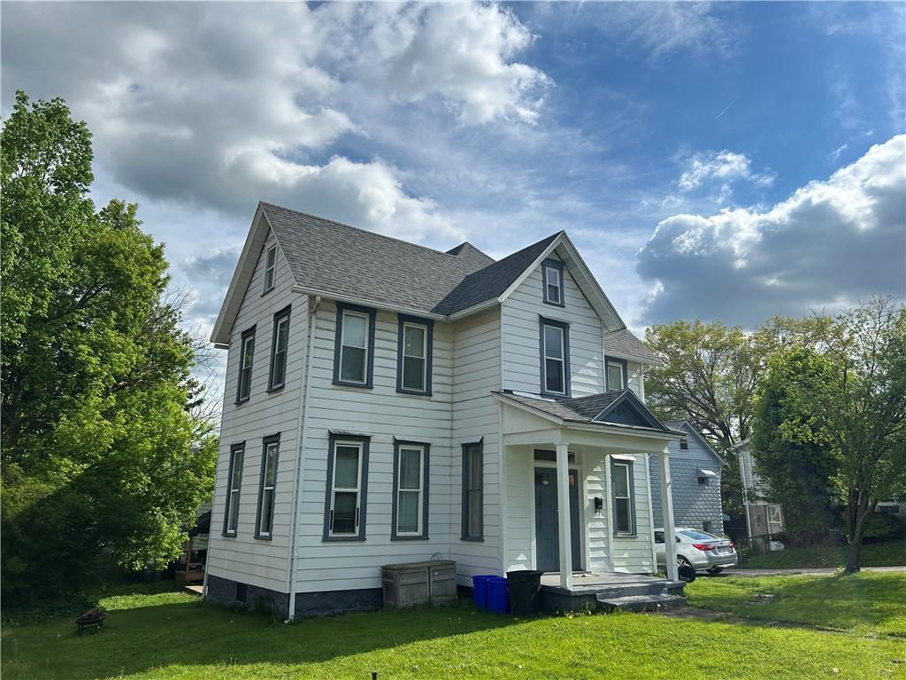 411 Cherry St, City Of But Ne, PA 16001 - view of front of home featuring a front yard and a shingled roof