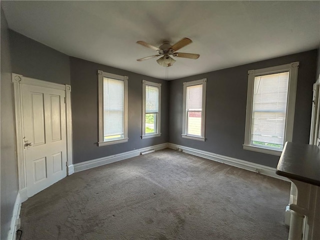 411 Cherry St, City Of But Ne, PA 16001 - carpeted empty room featuring a ceiling fan and healthy amount of natural light